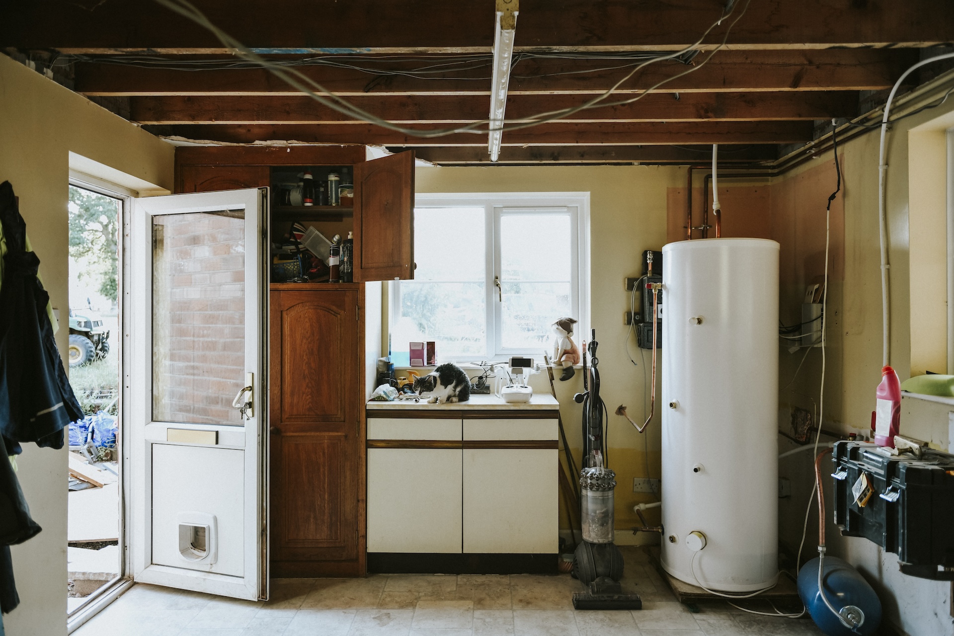 View of a water heater in home garage